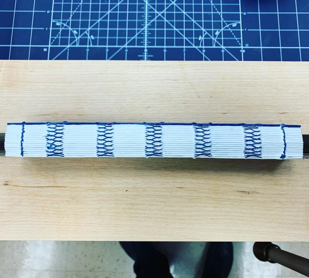 Read more about the article Gluing up the spine on the sketchbook replacement taking over for the sheaf of l